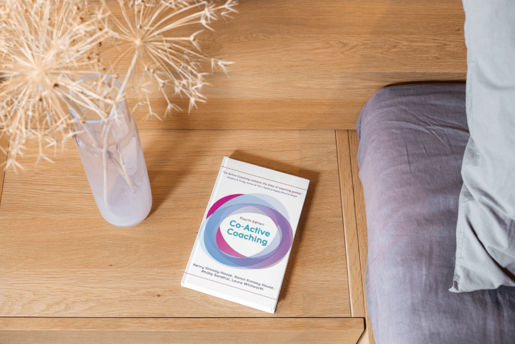 "Co-Active Coaching: The Proven Framework for Transformative Conversations at Work and in Life" by Karen Kim sey-House, Henry Kimsey-House, and Phillip Sandahl